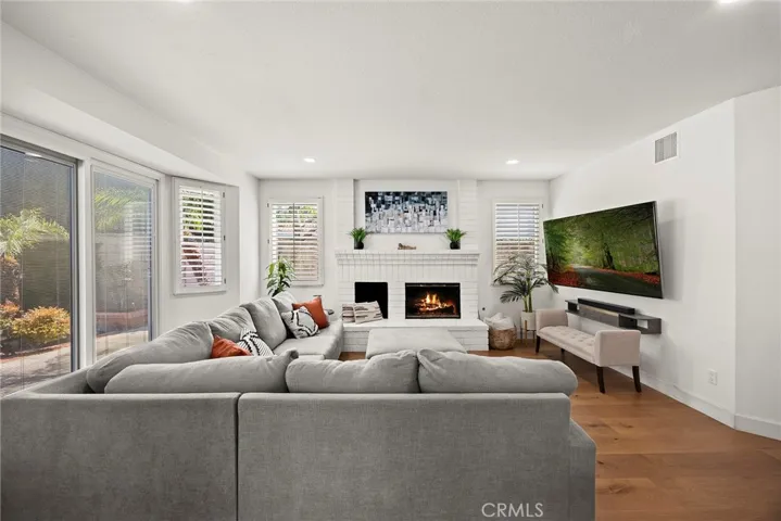 Sliding glass doors lead to the backyard. Great flow for indoor/outdoor entertaining.