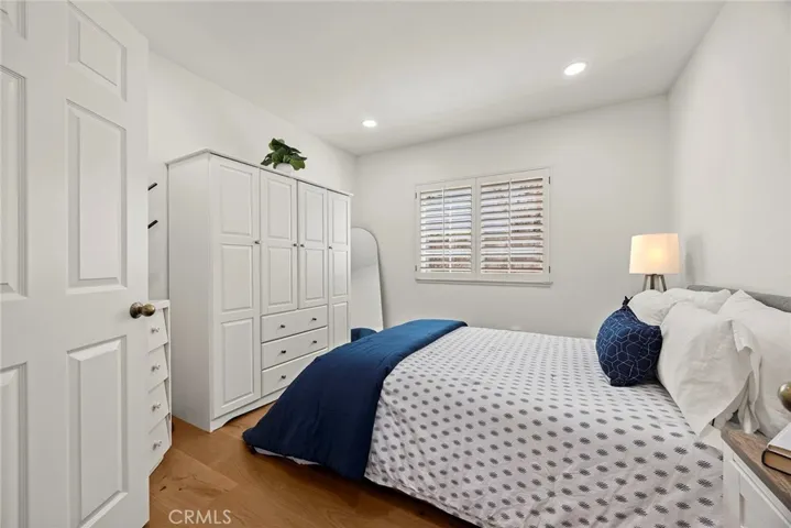 This room could be an office. Whether you work remotely or run a business from your home, this could be your command center. Ground level bedroom is adjacent to a newly remodeled bath with a large walk-in shower.