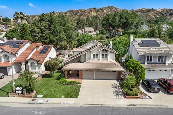 Located in a well maintained and friendly neighborhood, you will be proud to welcome guests. Notice the direct access 3 car garage. There is space for cars, equipment and more. What a lovely setting! Neighborhood shows pride of ownership and is in a highly desirable school district. Convenient access to both 57 and 60 freeways allows for easy commutes.