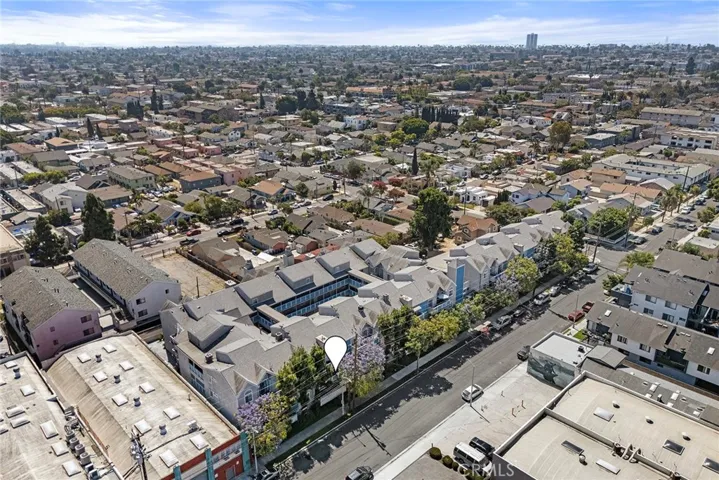 Aerial view of the three-story condo community featuring 38 units, with a location pin highlighting the subject property.