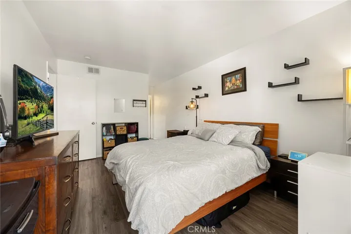 Natural light fills the room from the slider to the private patio slider.