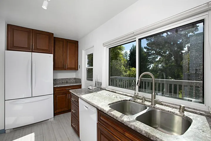 Remodeled Kitchen w/ access to Rear Patio