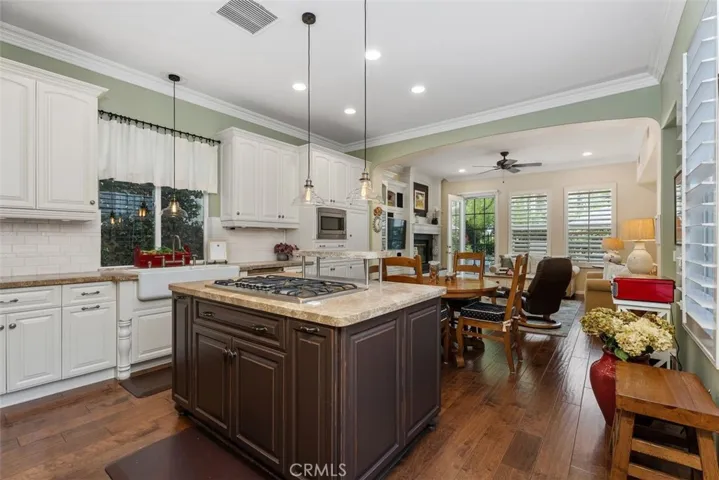 Exquisite Chef's Kitchen with High-end Appliances, Stone Counters and a Beautiful Farmhouse Sink.