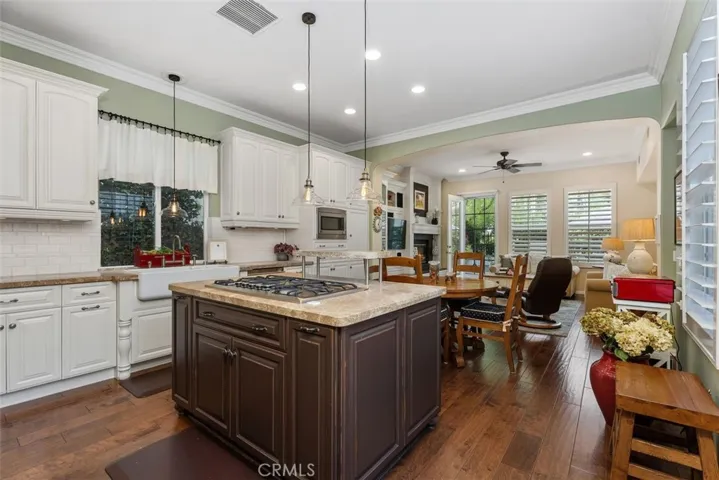 Exquisite Chef's Kitchen with High-end Appliances, Stone Counters and a Beautiful Farmhouse Sink.