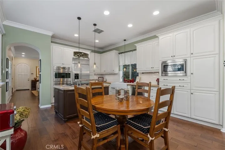 Exquisite Chef's Kitchen with High-end Appliances, Stone Counters and a Beautiful Farmhouse Sink.