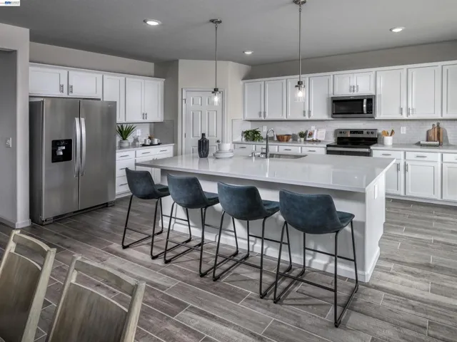 Photo is not of the actual home, but is an inspirational photo of builder’s model home and may depict options, furnishings, and/or decorator features that are not included