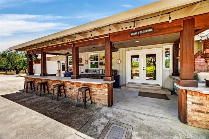 Rear covered porch and outdoor kitchen/BBQ
