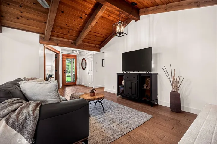 Family Room with beautiful vaulted wood ceilings