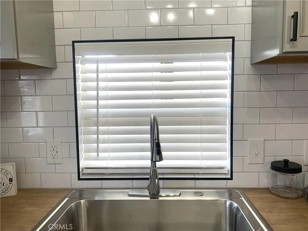 Farm sink and full tile backsplash