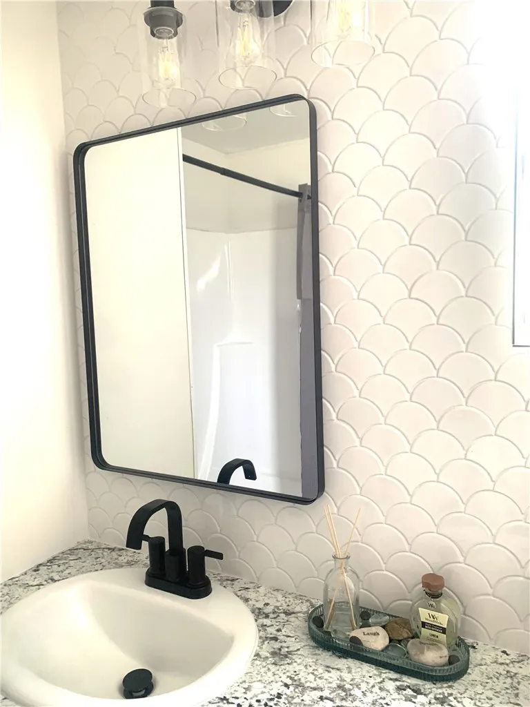 Hand set tile vanity wall