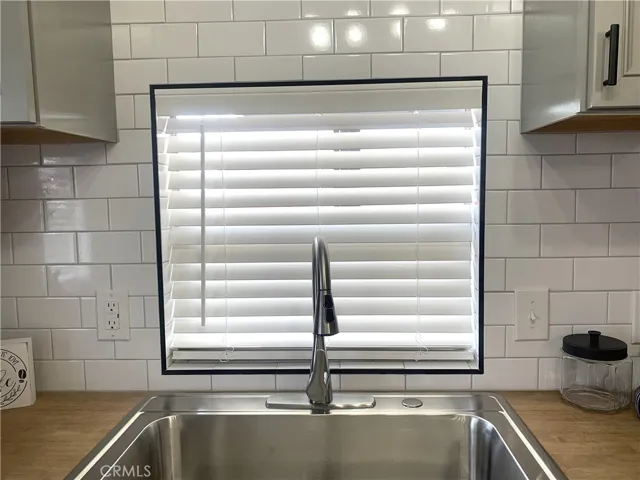 Farm sink and full tile backsplash