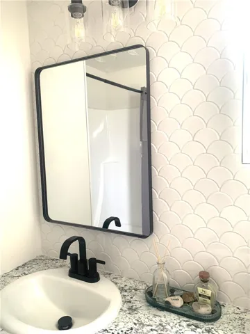 Hand set tile vanity wall