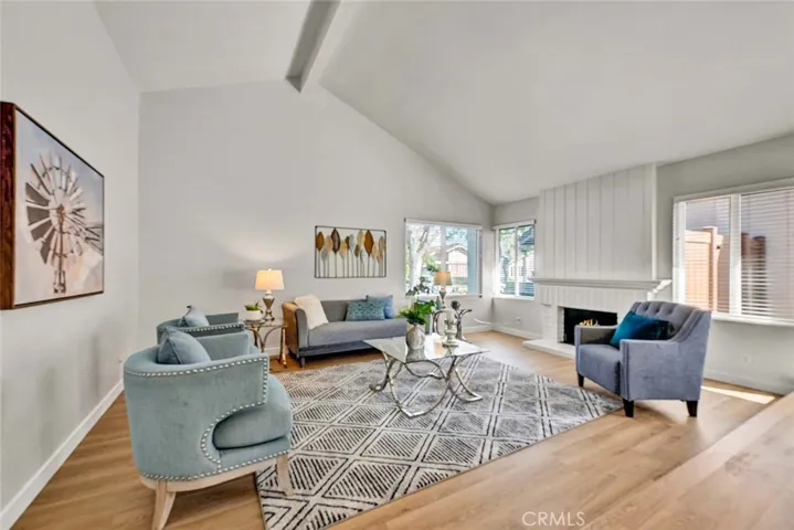 Living room with high ceilings and fireplace