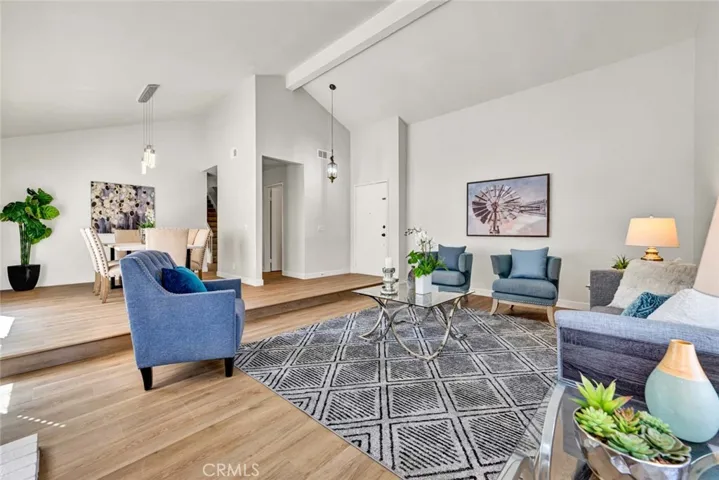 Living room with high ceilings and fireplace