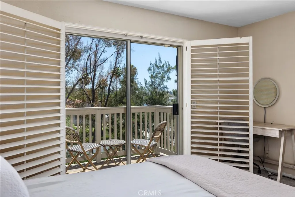 Primary bedroom peekaboo lake view