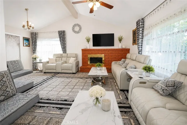 Comfortable family room with open flow to the entry and main living areas.