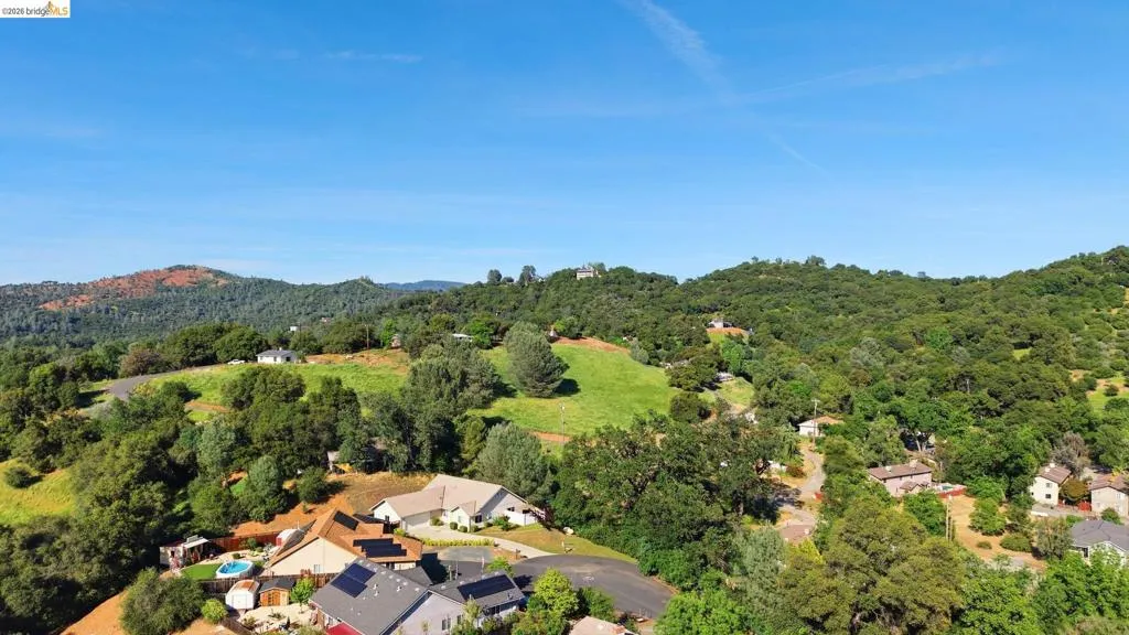 Drone / aerial view of a heavily wooded area