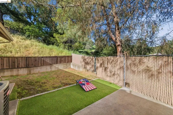 View of fenced backyard