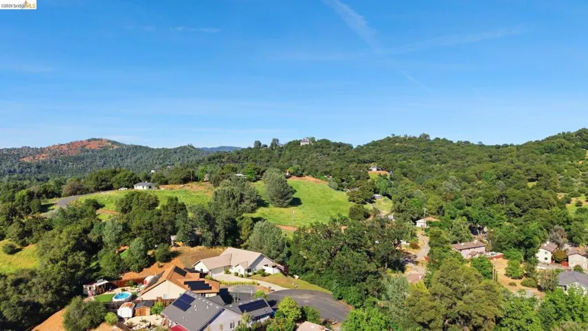 Drone / aerial view of a heavily wooded area
