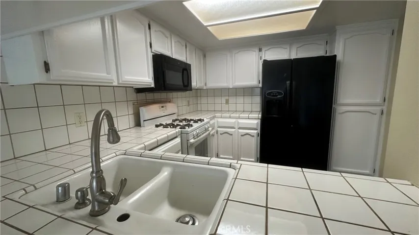Refrigerator included: AS IS