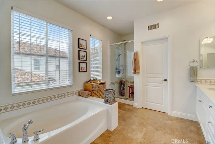 Separate soaking tub