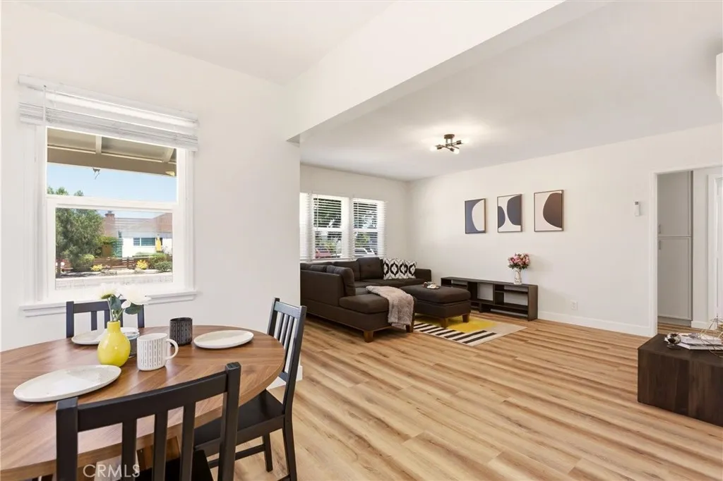 View from the dining room into the living room of the single family home.