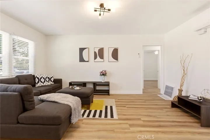 Walk in to tons of natural light peeking through brand new windows in this beautifully remodeled home.
