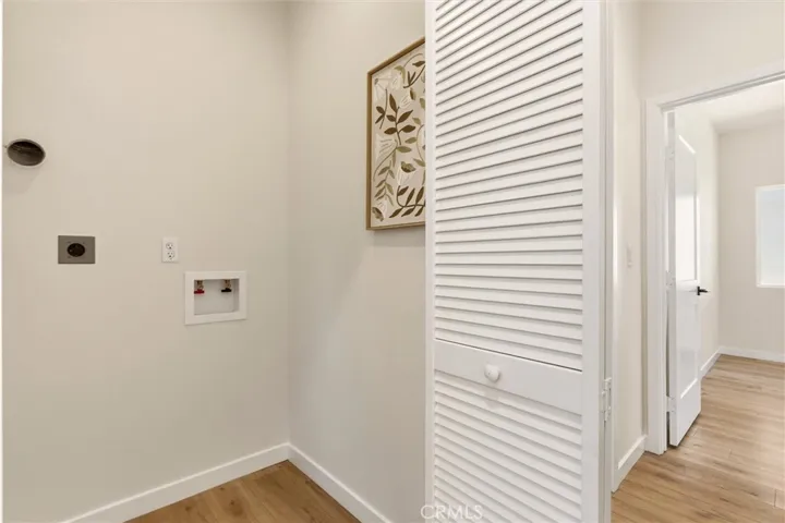 Unit B - Conveniently placed in home laundry room.