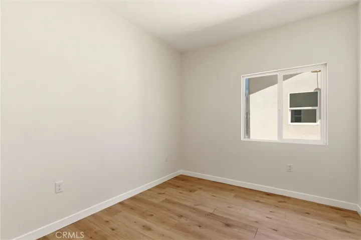 Unit B - Primary bedroom with ensuite bathroom.
