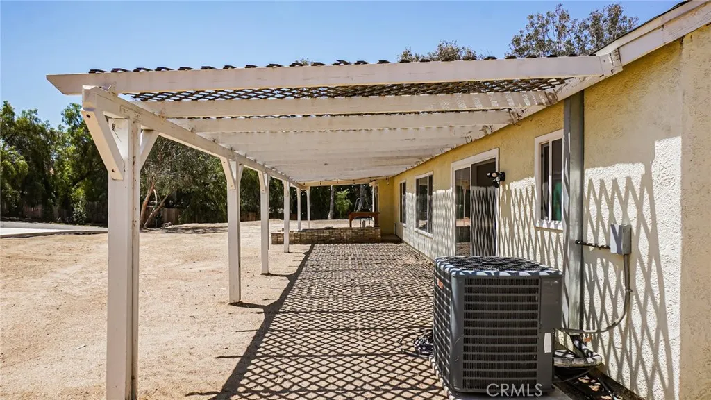 Large Patio. Stepping out to the back, you will have a covered patio, perfect for outdoor dining, entertaining, or relaxing all year-round!