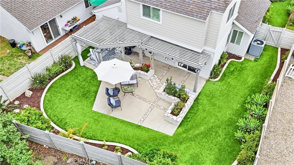 The expansive yard offers a sense of space that is increasingly difficult to find.
