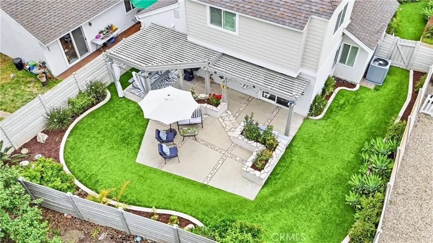 The expansive yard offers a sense of space that is increasingly difficult to find.