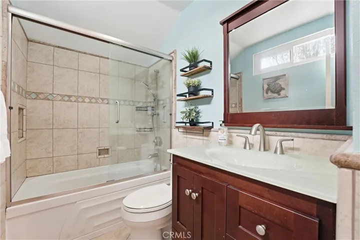 The secondary bath with tub and shower combo