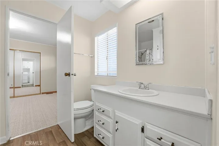Bathroom #2 sits off Bedroom #2 and also has access to the Laundry Room!