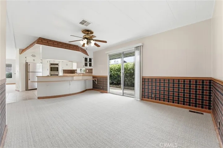 Family Room with access to the Kitchen and outdoor patio area!