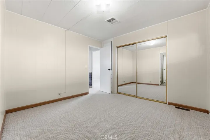 Bedroom #2 has a large closet with mirrored closet doors!
