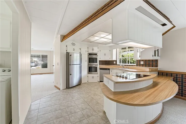 Breakfast counter seating is off the Family Room!