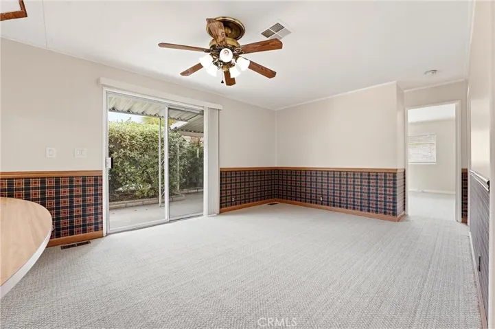 Family Room with sliding glass door to the covered patio area!