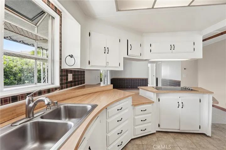 Kitchen is open to the separate Family Room!