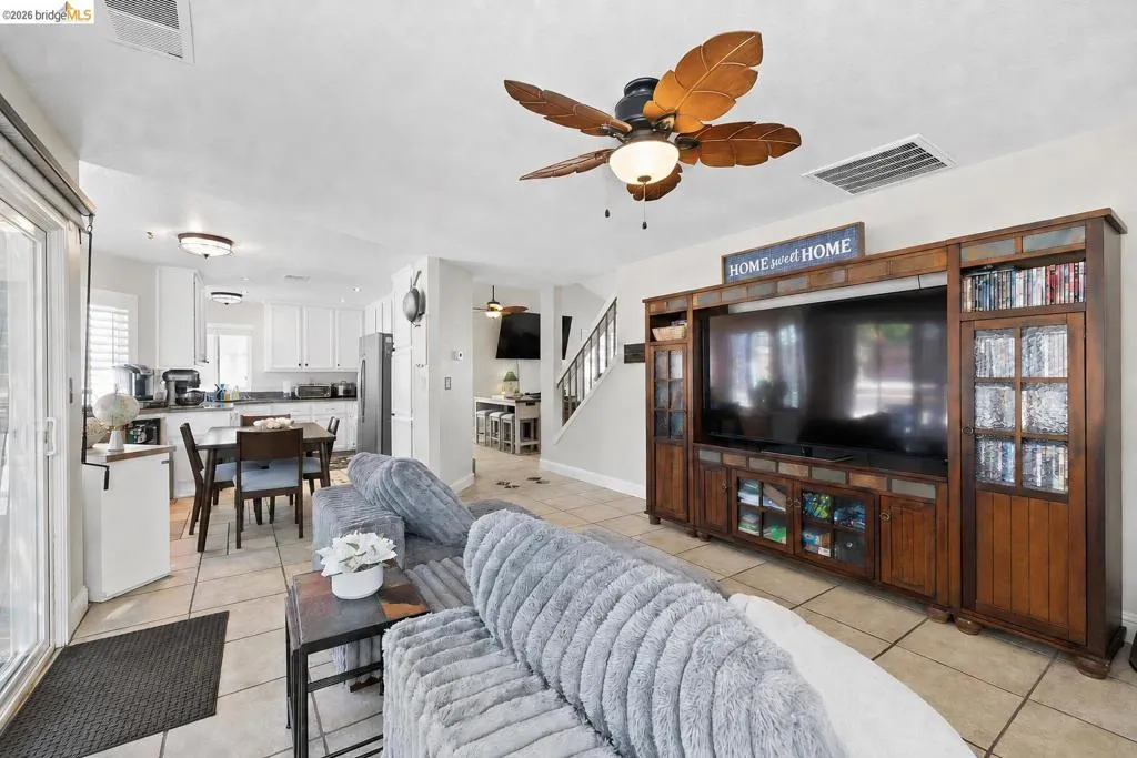 Bright interior featuring tile flooring