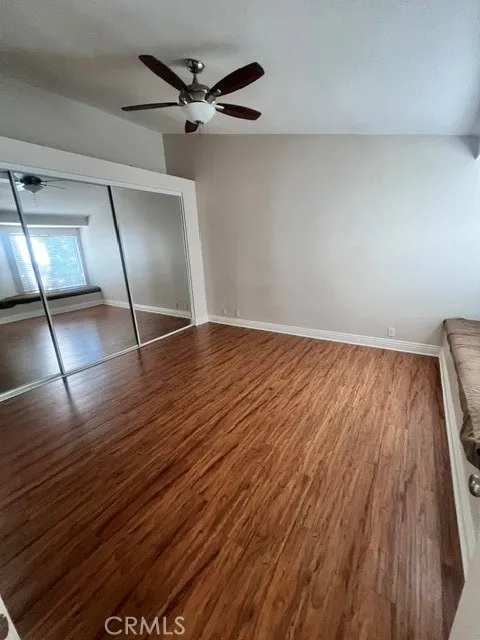 Primary Bedroom vaulted ceilings - Mirrored Closet doors
