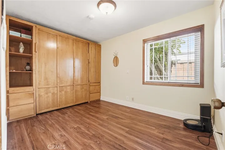 This versatile main-level room has a built-in Murphy Bed, and is ideally suited as a home office, guest bedroom, or creative workspace. This room is adjacent to a full main-floor 3rd bathroom.