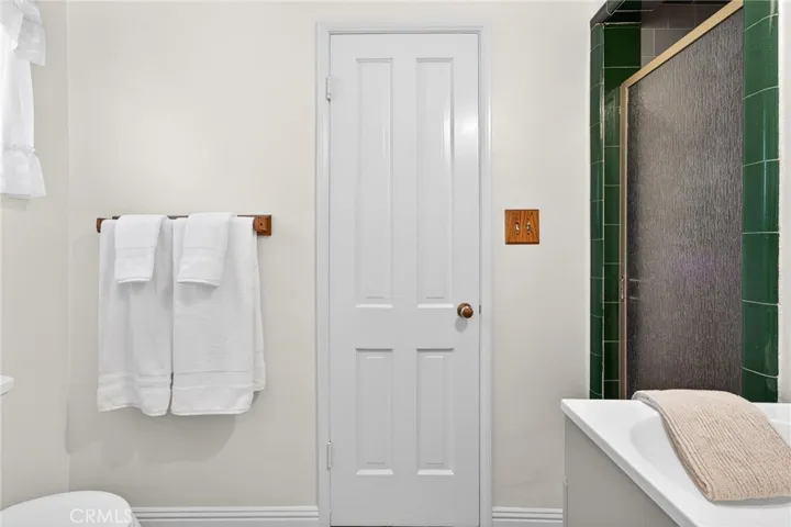 Bathroom 1 is off the kitchen