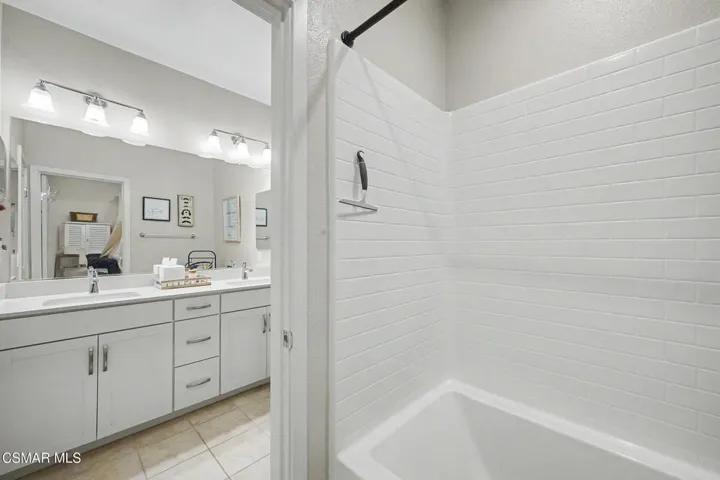 Hall bath has private tub/shower