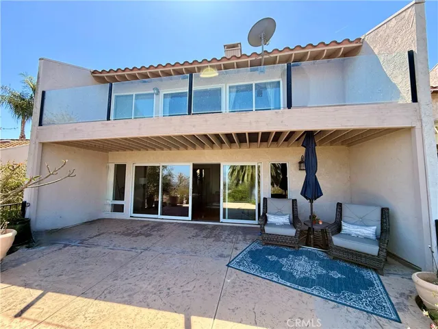 Rear elevation with seating and standing room to enjoy spectacular overlooking views of Riverside