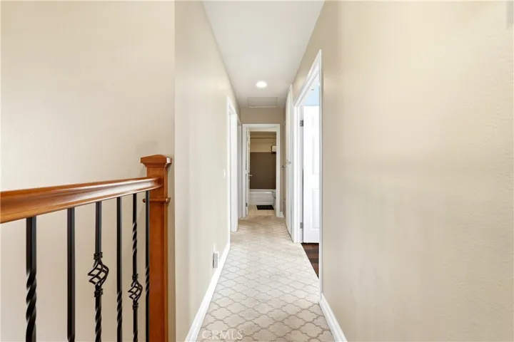 Upstairs Hallway leading to the 3 bedrooms and restroom.
