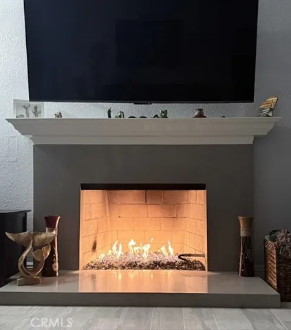 Cozy glass rock fireplace