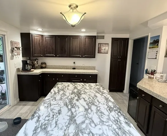Kitchen with center island and extra storage