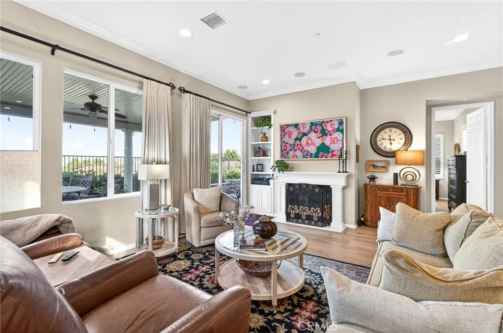 Fireplace in Living Room and Frame TV above the Mantle
