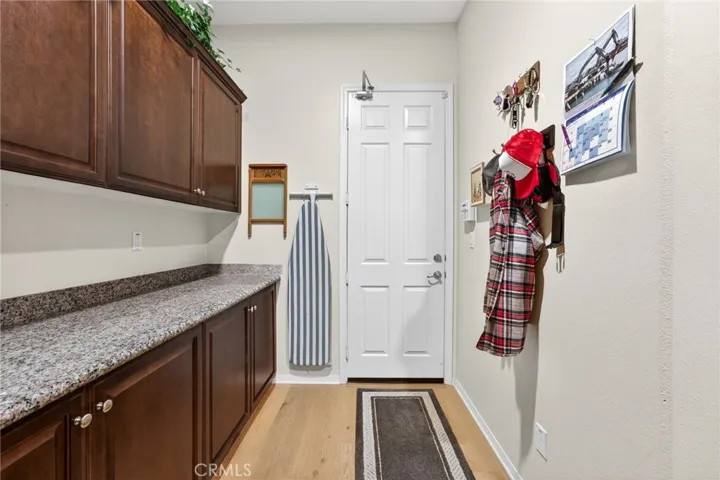 Laundry Room Wraps around and leads to the Garage Door